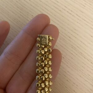 14k gold Peruvian bracelet 

20g
. Has denting which gives “hammered” look.